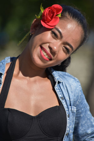 Youthful Minority Adult Female And Happiness With Rose Flowerの写真素材