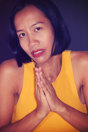 Pretty Asian Adult Female Praying Isolated