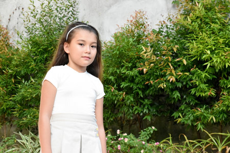 An Unhappy Minority Female Kid Outdoorsの写真素材