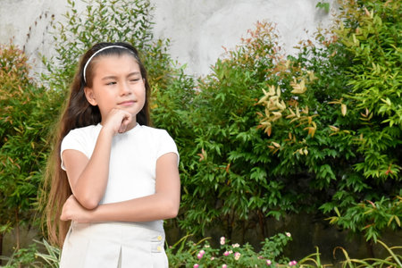 A Philippina Girl Decision Making Outsideの写真素材