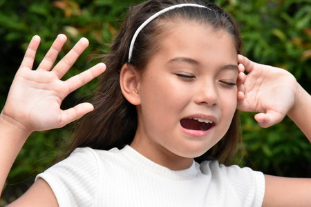 A Fearful Youthful Philippina Person Outsideの写真素材