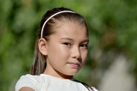A Serious Young Philippina Female Outsideの写真素材