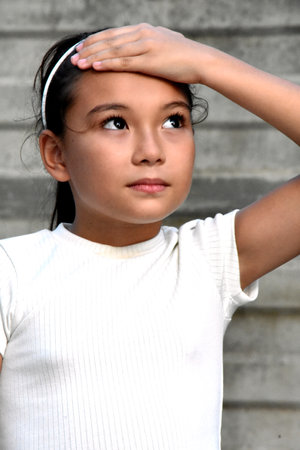 A Forgetful Asian Child Girlの写真素材