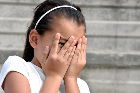 A Shy Afraid Female Childの写真素材