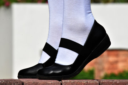 Teen Female Wearing Black Shoes And White Socksの写真素材