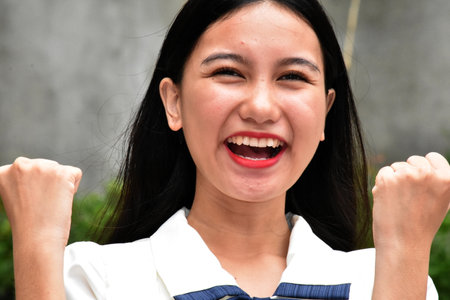 A Proud Excited Asian Womanの写真素材