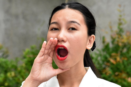 An Asian Woman Talking Or Yellingの写真素材