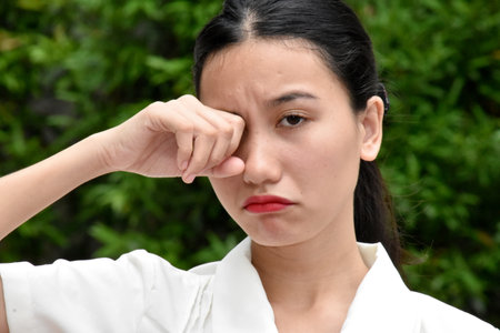 A Sad Asian Woman Cryingの写真素材