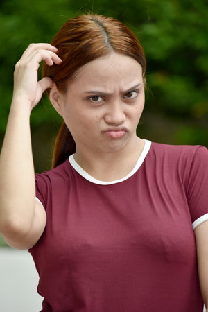 A Youthful Female And Confusionの写真素材