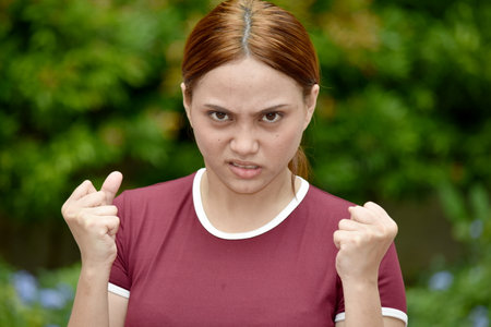 Redhead Female And Anger Wearing Tshirtの写真素材