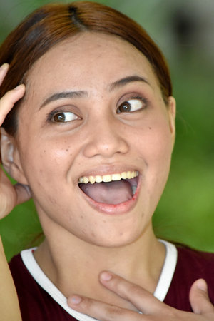 A Surprised Youthful Redhead Womanの写真素材