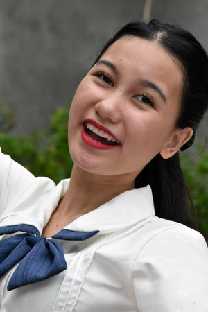 Portrait Of Happy Female Asian Womanの写真素材