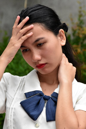 A Stressed Female Asian Womanの写真素材