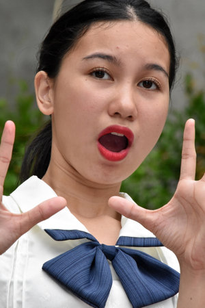 Scared Or Shocked Adult Asian Femaleの写真素材