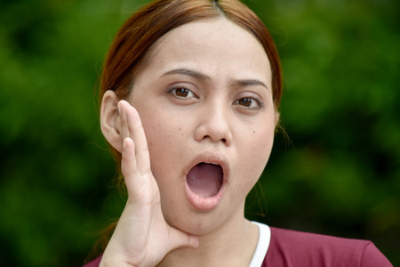 Attractive Diverse Female Talking Wearing Tshirtの写真素材