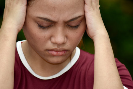 A Worrisome Young Filipina Personの写真素材