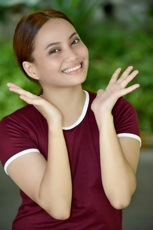 Surprised Pretty Adult Female Wearing Tshirtの写真素材