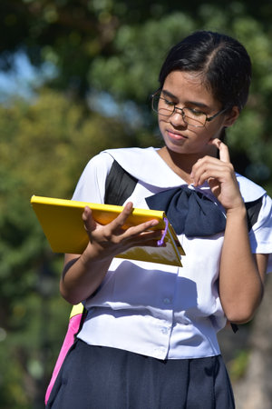 Student Teenager School Girl Reading Wearing Glassesの写真素材