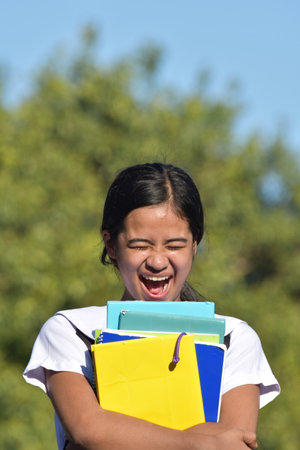 A Beautiful Philippine Teen Girl Laughingの写真素材