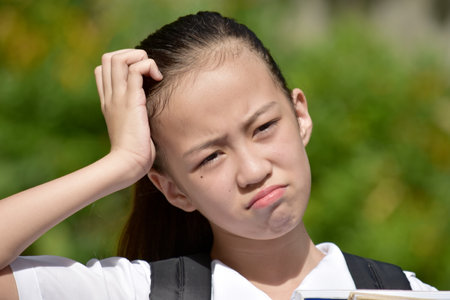 A Confused Cute Asian Personの写真素材