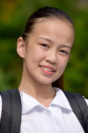 A Youthful Minority Female Student Smilingの写真素材