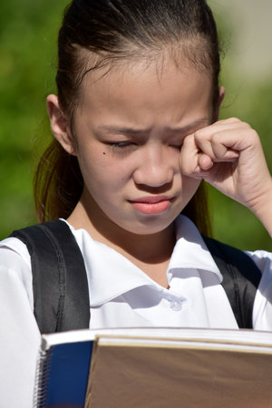 A Tearful Filipina School Girlの写真素材