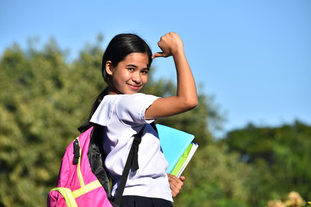 Proud Beautiful Filipina Female Student Wearing Bookbagの写真素材