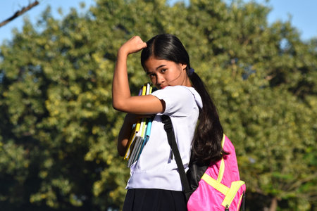 Strong Cute Filipina Girl Student Wearing School Uniformの写真素材