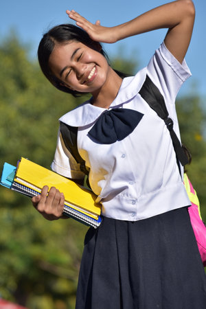 Cute Filipina School Girl Student Teenager Smilingの写真素材