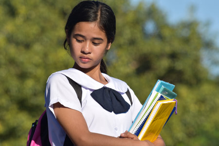 A Girl Student With Eyes Closedの写真素材