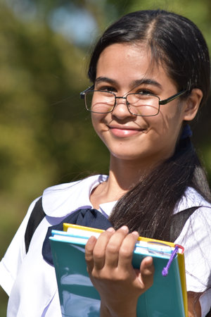 A Happy Cute Minority Female Studentの写真素材