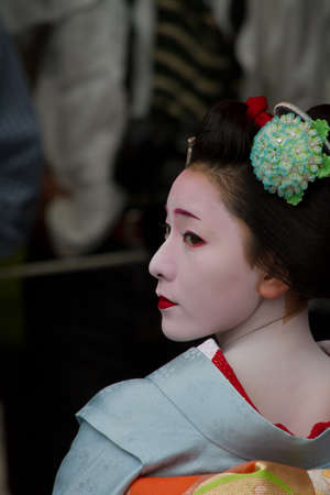 KYOTO, JAPAN - JUNE 5: Unidentified Maiko on houjoue event stands on the famous Shirakawa street in...