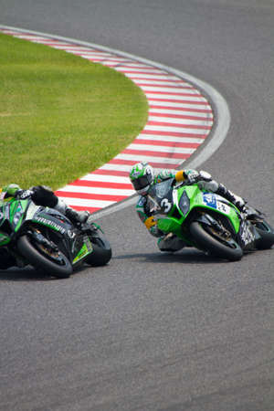 SUZUKA, JAPAN - July 29 : Rider of RS-ITOH&ASIA (13th place team) racing at 2012 Suzuka 8 hours World Endurance Championship Race, on July 29, 2012 in Suzuka Circuit, Japan.のeditorial素材