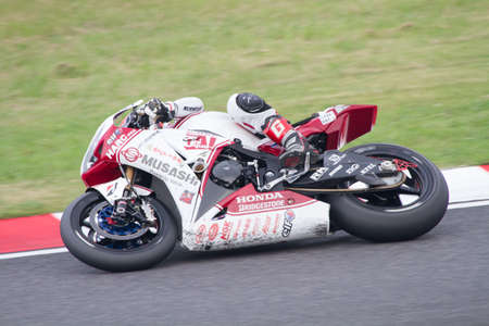 SUZUKA, JAPAN - July 28 : Rider of MuSASHi RT HARC-PRO. (Winner team) racing at 2013 Suzuka 8 hours World Endurance Championship Race, on July 28, 2013 in Suzuka Circuit, Japan.のeditorial素材