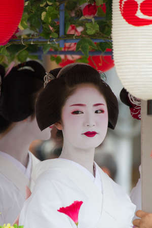 KYOTO - JULY 24  Unidentified Maiko girl  or Geiko lady  on parade of hanagasa in Gion Matsuri  Festival  held on July 24 2014 in Kyoto, Japan  It is one of Kyoto s renowned three great festivals  のeditorial素材