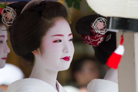 KYOTO - JULY 24  Unidentified Maiko girl  or Geiko lady  on parade of hanagasa in Gion Matsuri  Festival  held on July 24 2014 in Kyoto, Japan  It is one of Kyoto s renowned three great festivals  のeditorial素材