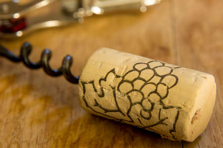 opener for wine with a cap on top