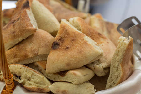 pieces of bread served at the tableの写真素材