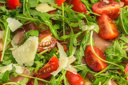 Pizza served on a table in a plateの写真素材
