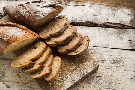 Two types of homemade bread on a cutting board, gluten free. Organic diet food, for people that...