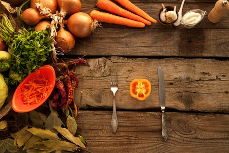 Pepper as sorce of vitamins for vegeterians and people on diet on wooden background.の写真素材