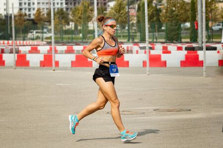 Triathlon competition in Baku. Athlete running on distance.のeditorial素材