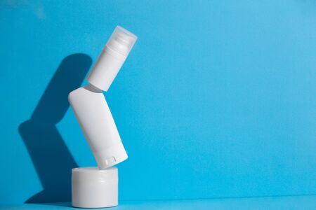 Set of blank white skincare cosmetic products on background with free space for advertising text....