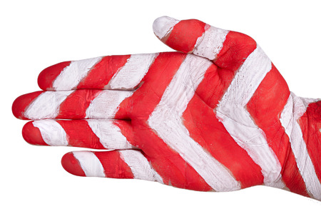 Direction of movement. Hand with the drawn traffic signの写真素材