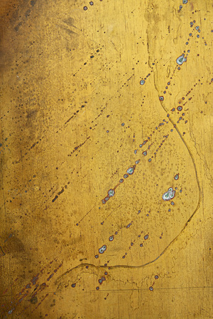 Grunge old brass background with sulphate spotsの写真素材