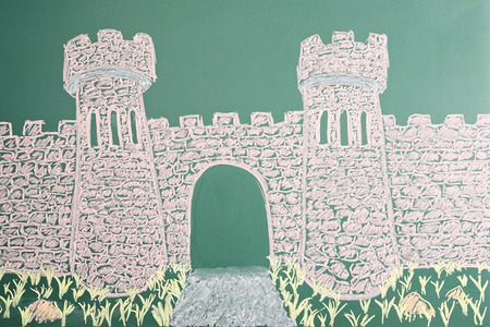 Education concept. Chalk drawing of castle with open gateの写真素材