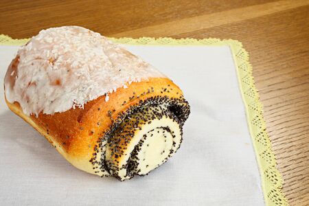 Appetizing roll with poppy and sugar coatingの写真素材