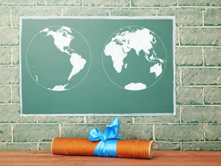 Chalk drawing of Earth map on blackboard