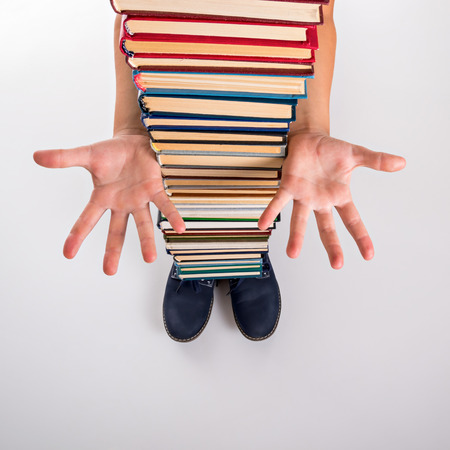 Unusual funny education concept with book boyの写真素材