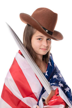 Smiling girl with american flag and sword. Isolation on whiteの写真素材